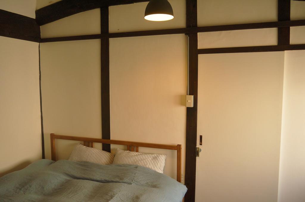 Minatoya Guesthouse Iki Chambre photo